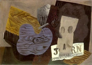 Calavera de guitarra y periódico 1913 Pablo Picasso Pinturas al óleo